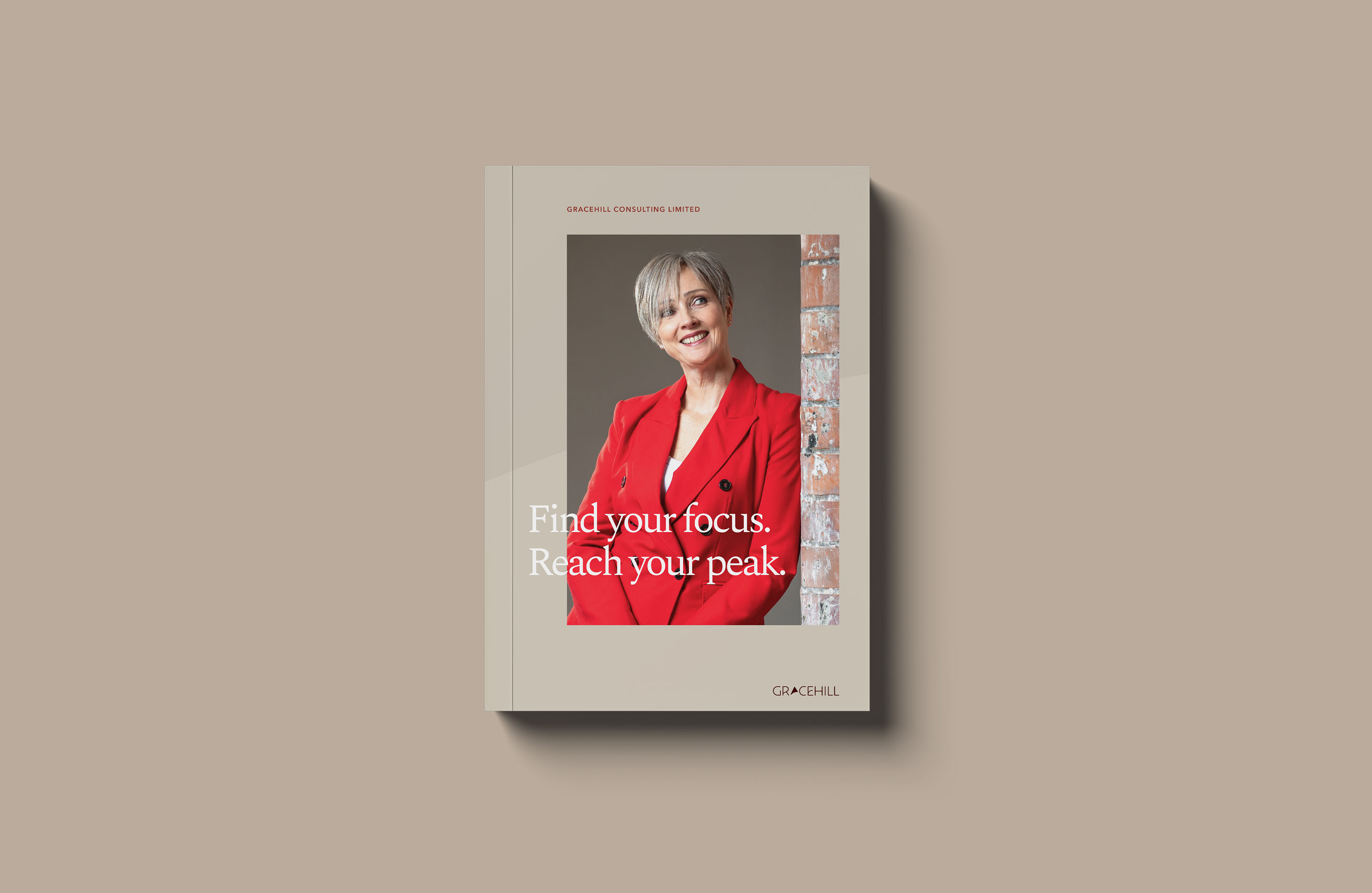 Gracehill Consulting brochure featuring a portrait and the message “Find your focus. Reach your peak.”