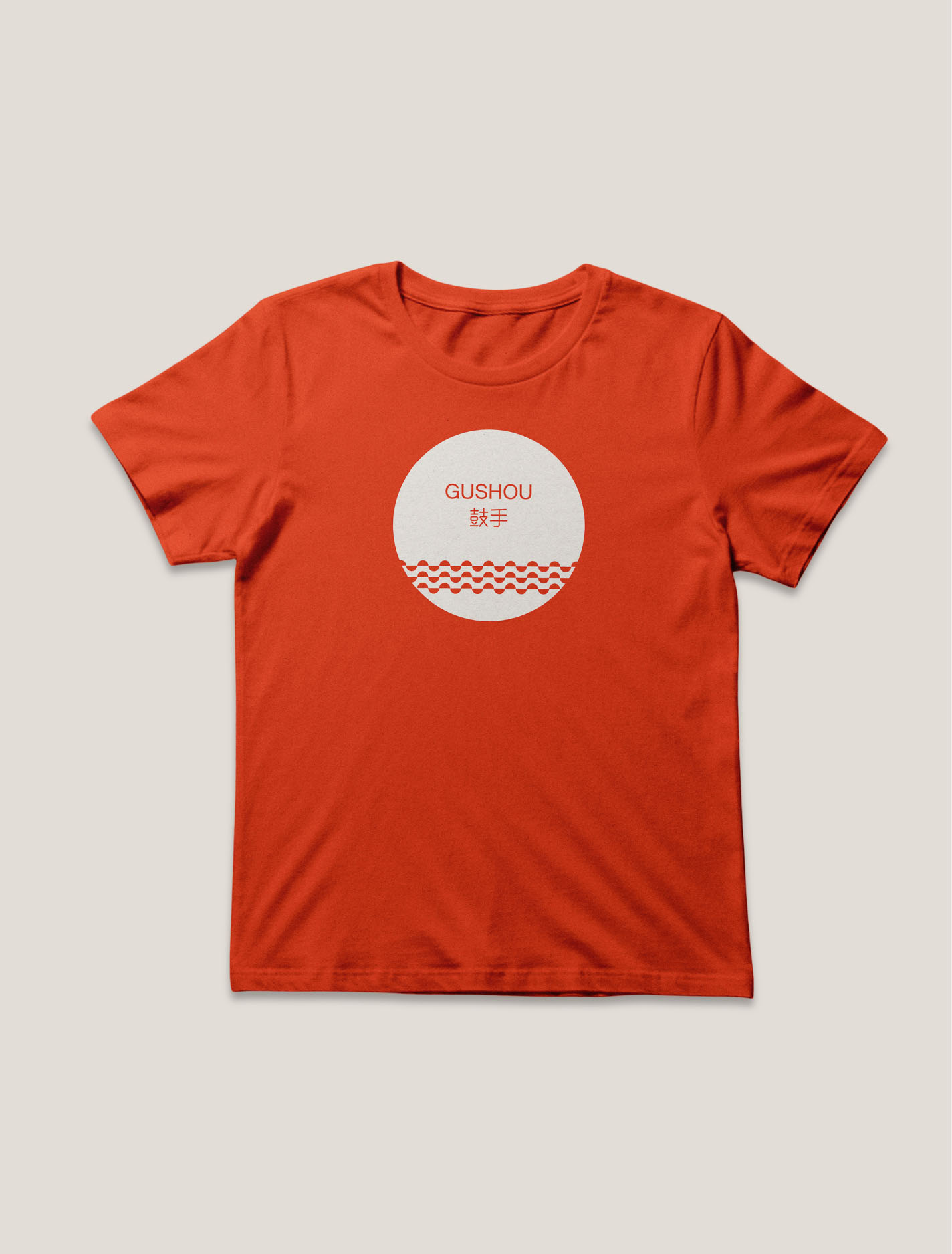 Orange Gushou T-shirt featuring a circular graphic from the dragon boat racing identity.