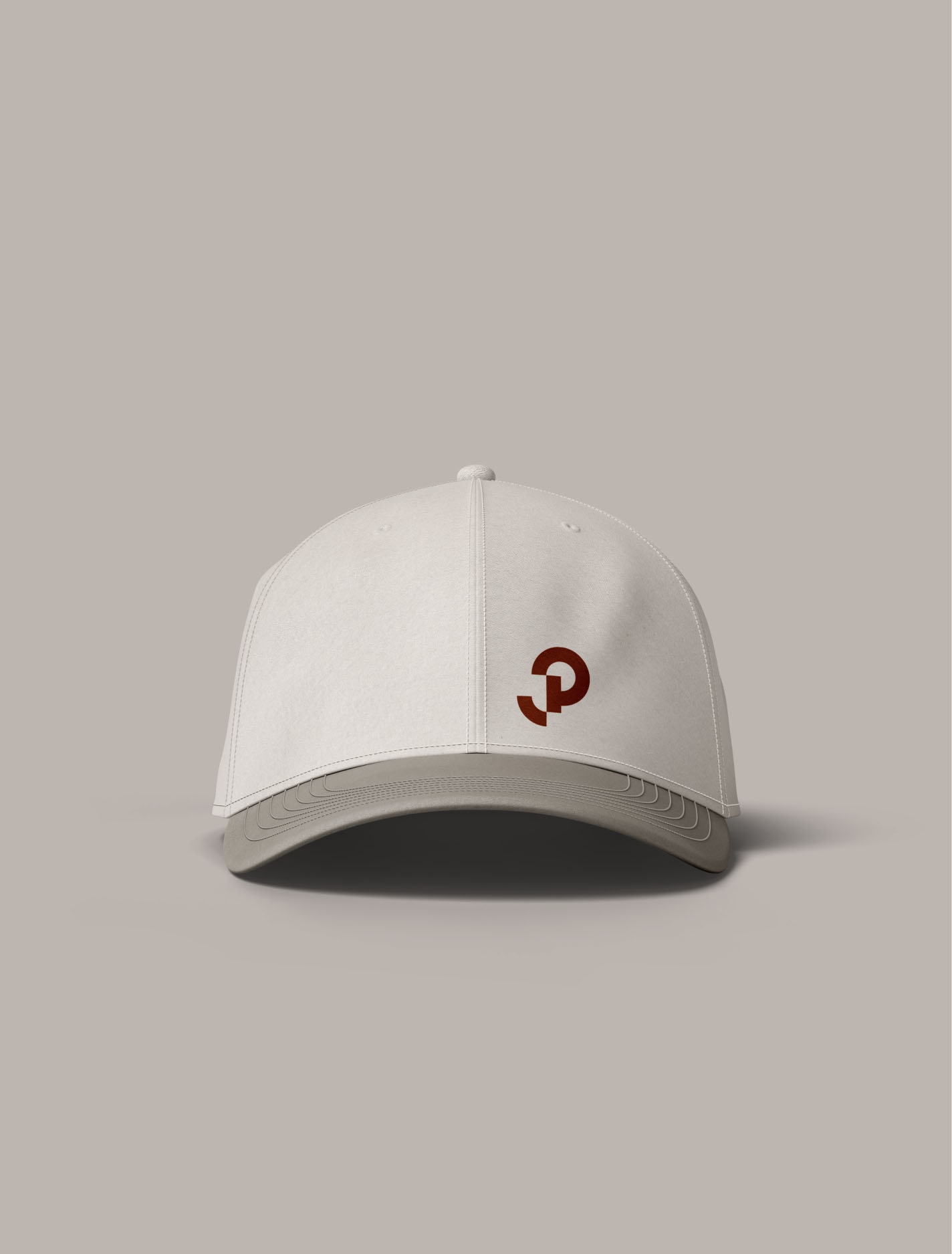 White Jarman Professional branded cap featuring the company’s geometric monogram.