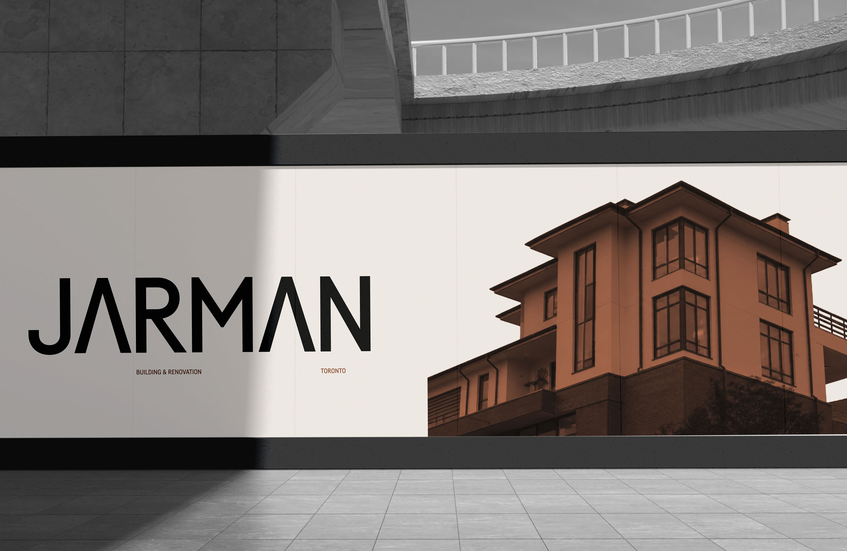 Jarman construction hoarding combining the wordmark with residential architecture photography.