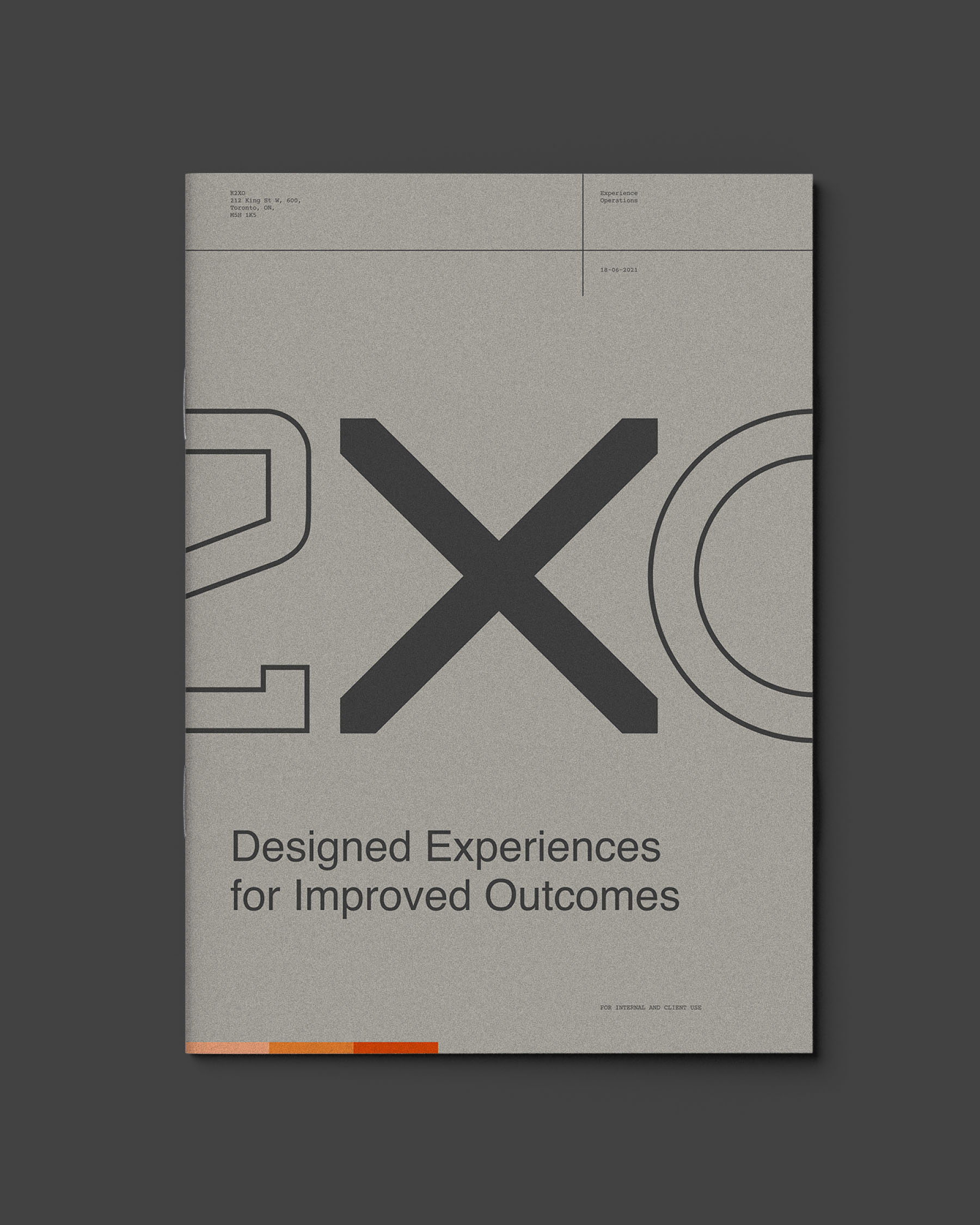 K2XO publication titled “Designed Experiences for Improved Outcomes,” featuring oversized geometric typography.