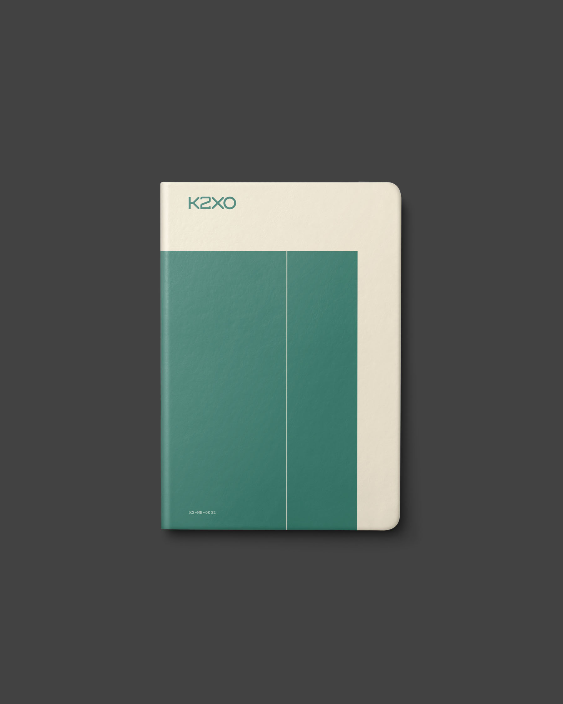 K2XO pocket notebook featuring a minimal teal and cream geometric cover design.