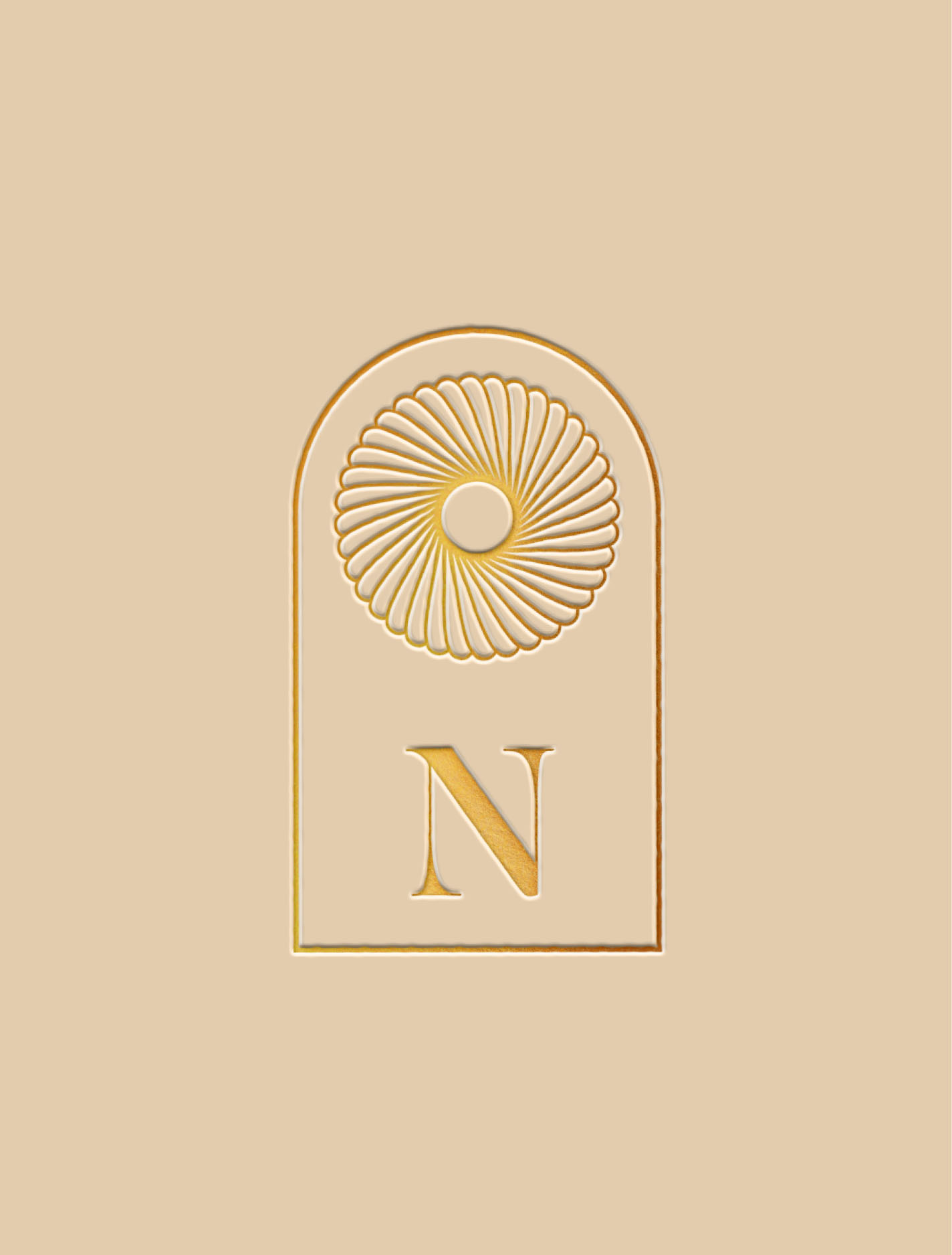 Nightingale Health identity detail featuring the circular monogram and gold foil treatment.